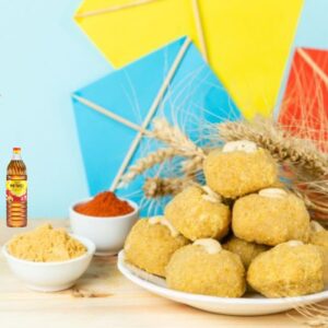 Netaji Kacchi Ghani Mustard Oil with festive Indian kitchen setup for Makar Sankranti celebration.”