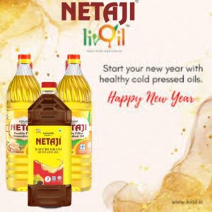 Ashoka Oil bottles with fresh ingredients representing a healthy New Year and heart-friendly cooking.